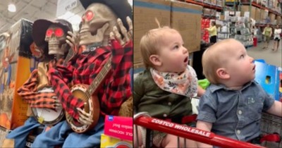 2 Babies In The Store Are Stunned By Music-Playing Halloween Decorations