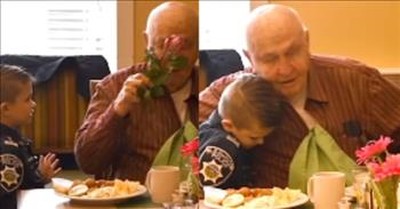 Adorable Boy Gifts Seniors with Flowers and Hugs 