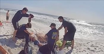 Bodycam Video of Dad After Heroic Rescue of His Kids Trapped in Riptide 
