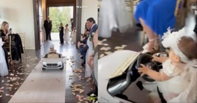 Flower Girl Drives Down The Aisle In Style