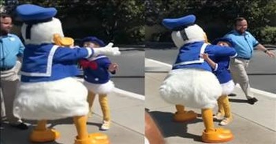 Heartwarming Moment Boy With Down Syndrome Meets Donald Duck 