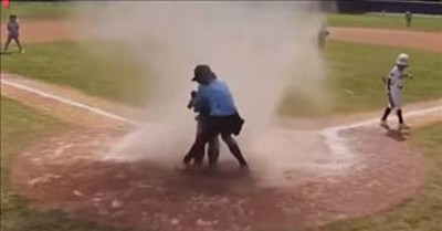 Umpire Saves 7-Year-Old Catcher From Dust Devil During Game 