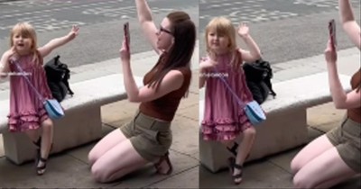 Mother And Daughter Worship The Lord In The Middle Of The Street