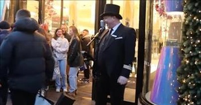 Singing Doorman Greets Customers With Bing Crosby’s ‘White Christmas’  