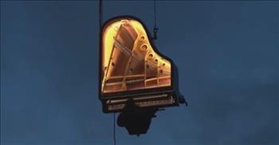 Incredible Video Of Man Playing Piano Hanging More Than 30 Feet In The Air 