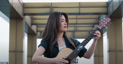 Young Woman Nails Guitar Cover Of Michael Jackson's 'Beat It'
