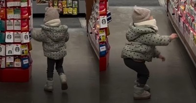 Child Hysterically Tries Jumping to Grab Balloons in Adorable Struggle