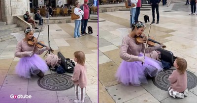 Little One Mesmerized by Woman’s Stunning Violin Performance