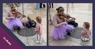 Little One Mesmerized by Woman’s Stunning Violin Performance