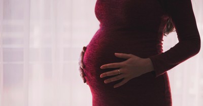 A pregnant woman, Adoption is better than surrogacy