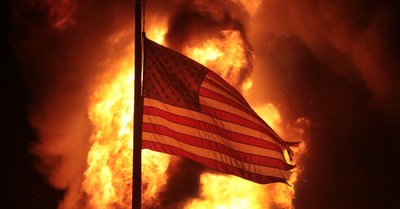A fire behind an American flag, faith leaders speak out against the shooting of a Black man and the riots that followed