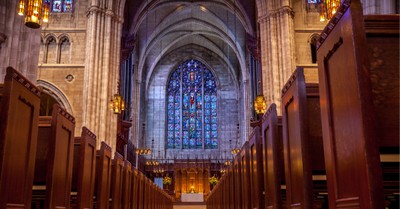 Inside of a church, Episcopalians Are Attending Church Less but Giving More
