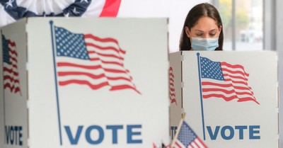 A woman voting, 13 pro-life women are elected