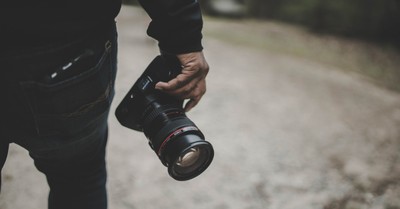 A person holding a camera, Christian photographer challenges Virginia law that could force him to photograph same-sex weddings