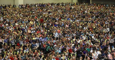 People voting at the SBC annual meeting, Saddleback Church's ordination of women pastors to be considered by SBC committee