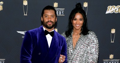 Russell Wilson and Ciara on a red carpet, Photo goes viral of the Wilsons praising God while at church