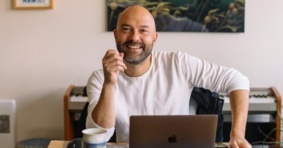 Joshua Harris sitting at a table, Harris launches course on 'deconstructing' your faith