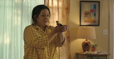 Melissa McCarthy holding a bird in The Starling, The Starling promotes hope to the grieving