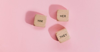 genders written on cubes, kid is suspended from a football for saying there are only 2 genders