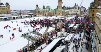 Rows of trucks and swarms of people protesting Canada's vaccine mandate, GiveSendGo is back online after being hacked