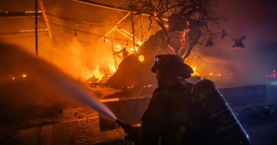 2 Dead and 200,000 without Power as California Fires Continue to Burn across Los Angeles 