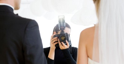 NY Settles $225K Lawsuit with Christian Photographer over Same-Sex Wedding Services