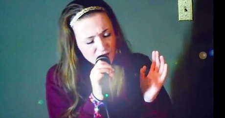 Young Girl Praises God With Powerful Christian Song