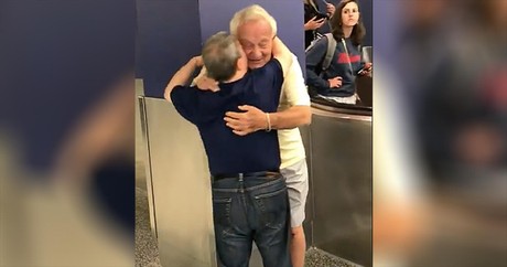 Father And Son With Down Syndrome Share Tearful Reunion At Airport