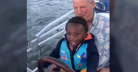 Toddler Has The Biggest Smile When Dad Lets Him Drive The Boat