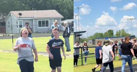 Young Runner Slows Down to Help a Struggling Competitor