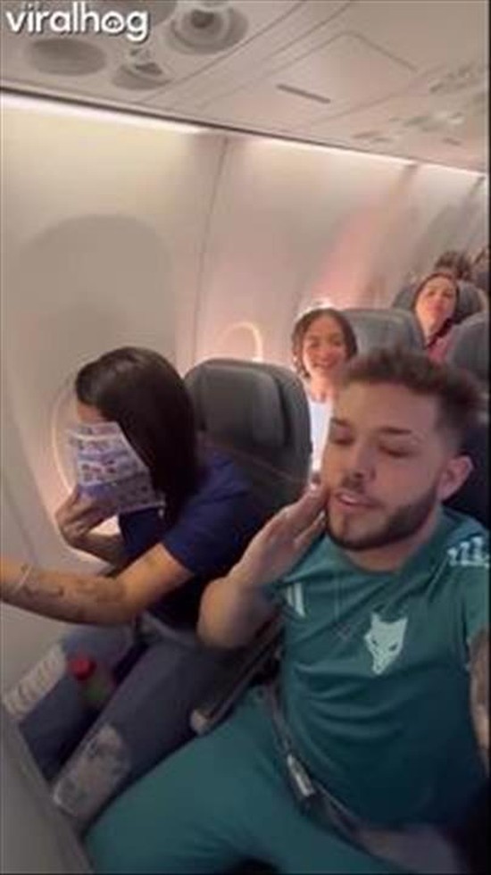 Passengers Cheer as Father-to-Be Reveals Baby News During Flight