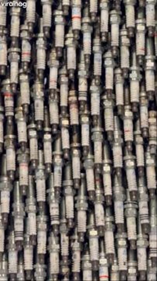 Bear Made Out of Spark Plugs