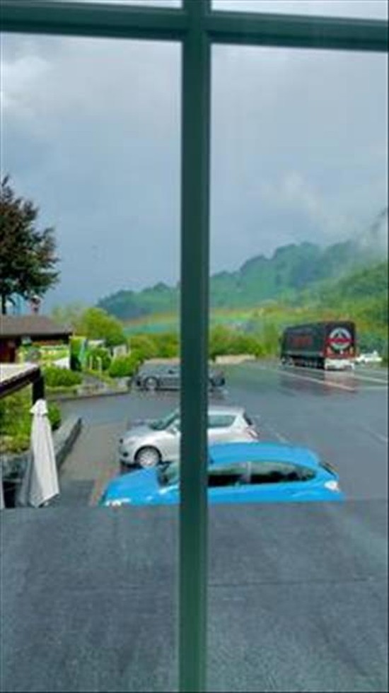 Standing above the Rainbow in the Switzerland