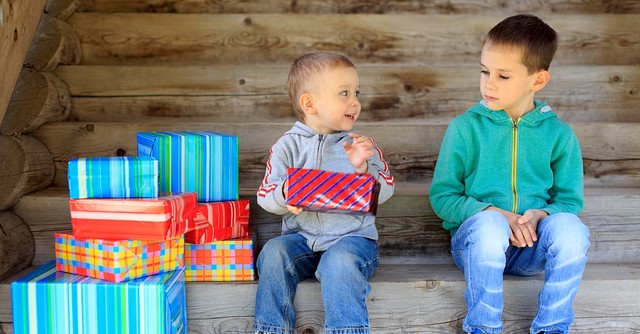 Two boys, one jealous of the other's presents