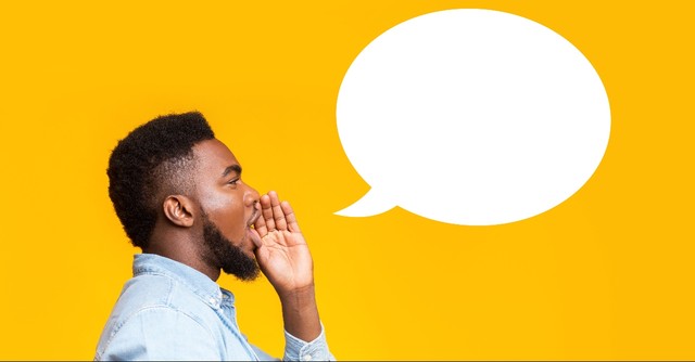 Man speaking into a speech bubble