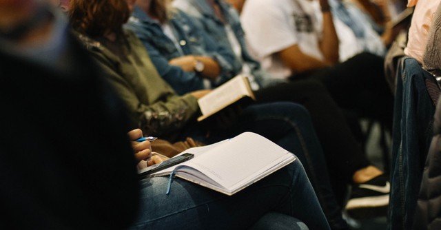 Church congregants sitting and taking notes, is nicene creed relevant today