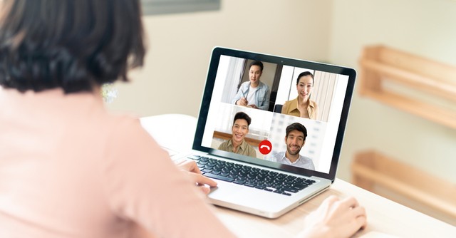 Woman in an online work meeting.