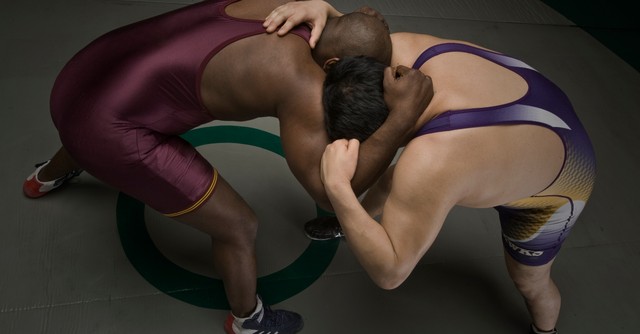 Two men wrestling