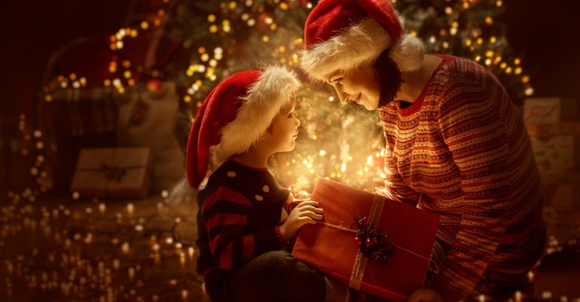 mother and son looking in magic present at christmas, best parts of christmas not presents