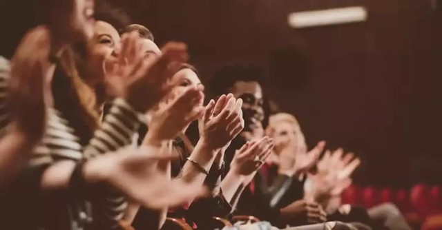 Audience clapping