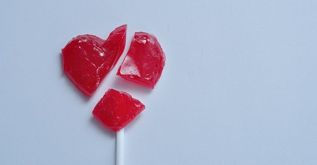 Red candy heart lollipop, broken into pieces