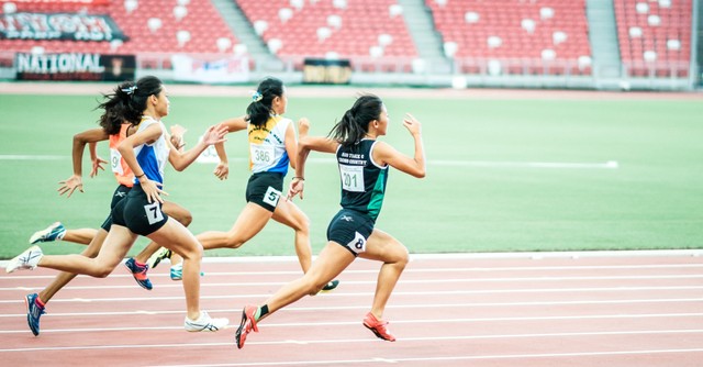 Women running track
