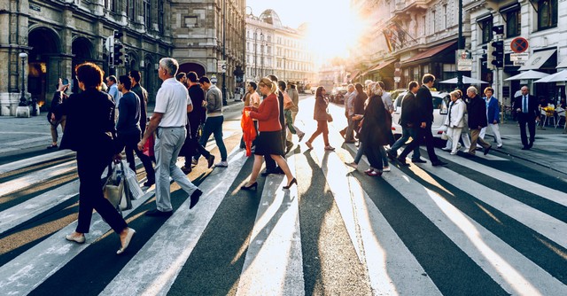 a group of people walking, nearly half of Americans think moral values are low
