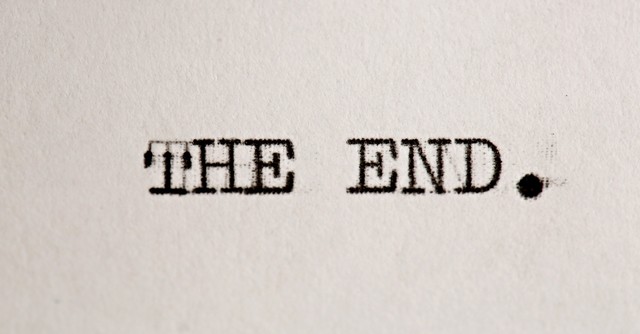 The End text on typewriter