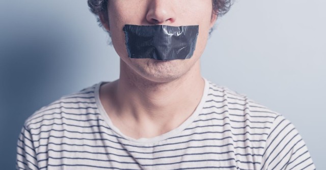 Man with duct tape over his mouth