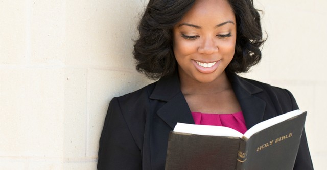 Woman reading the Bible