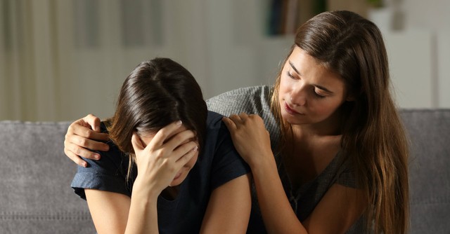 friend-comforting-getty-AntonioGuillem