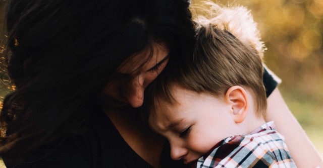 mom comforting child