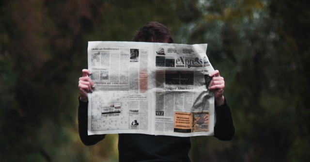 Man reading a newspaper