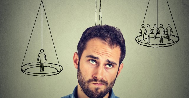 Man weighing the options